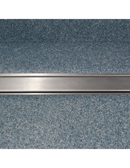 Wiper Drain VF Ponente Eingebaut In Grauem Vinylboden, Draufsicht Auf Die Ablaufabdeckung